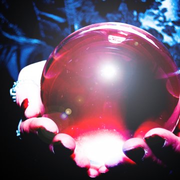 holding crystal globe psychic services